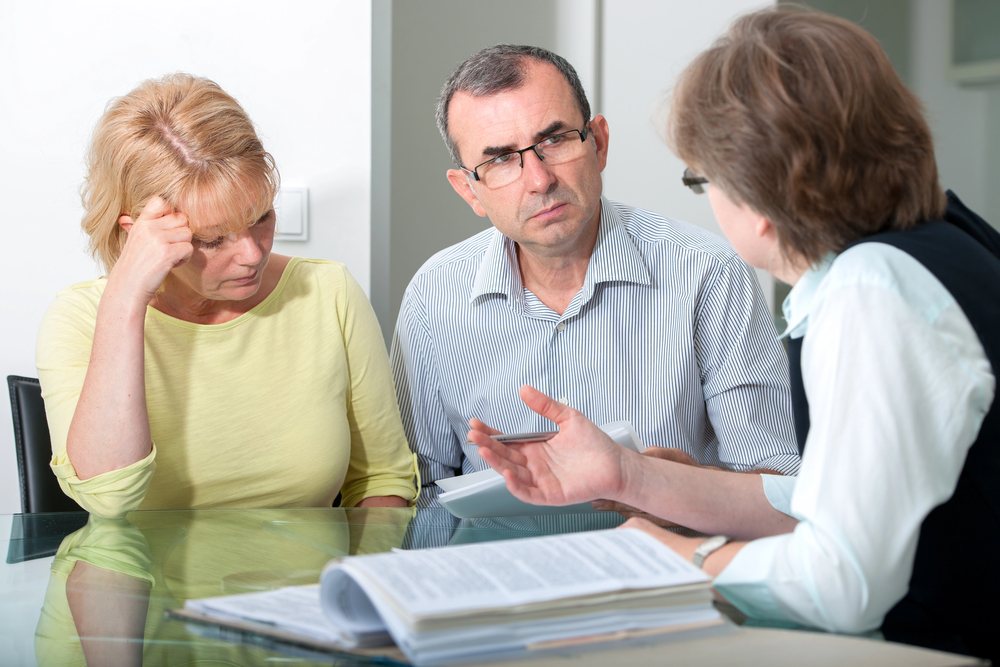 Champaign nursing home abuse lawyer discussing legal options with a concerned family