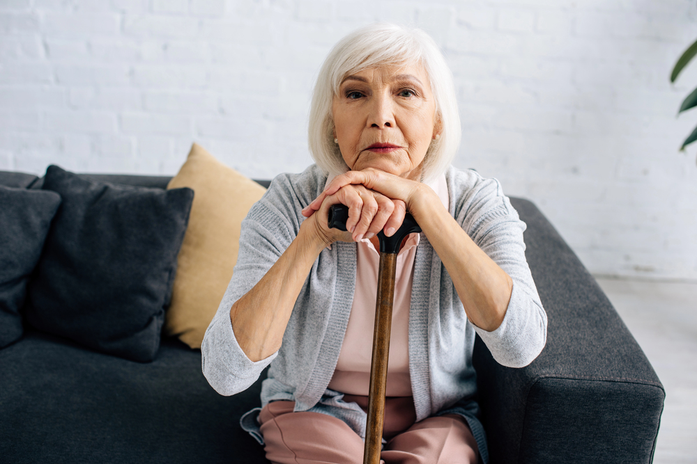 Personal injury lawyer assisting elderly women victims of nursing home abuse, advocating for justice and compensation.