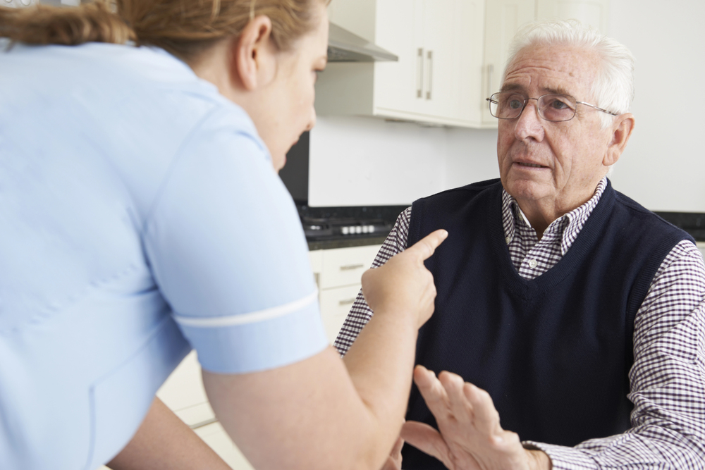 Waukegan nursing home abuse lawyer discussing a case with a concerned family