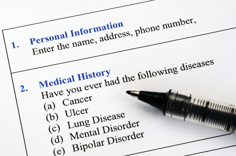 Attorney in Peoria reviewing medical records related to nursing home neglect