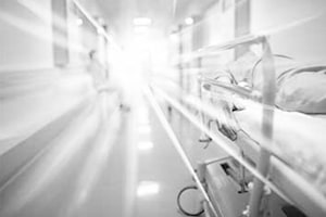 Attorney reviewing nursing home abuse case involving elderly resident